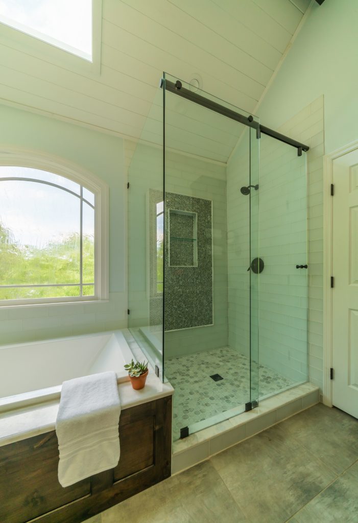 Atlanta area master bedroom with shower designed by Stoeck Interiors.